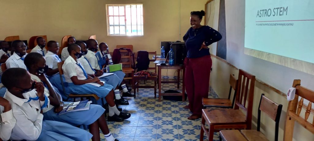 Tutor Elizabeth Wanjiriu Kamau, a University of Nairobi Astrophysics graduate, provides mentorship to schoolgirls by talking about her own journey through education and her career path