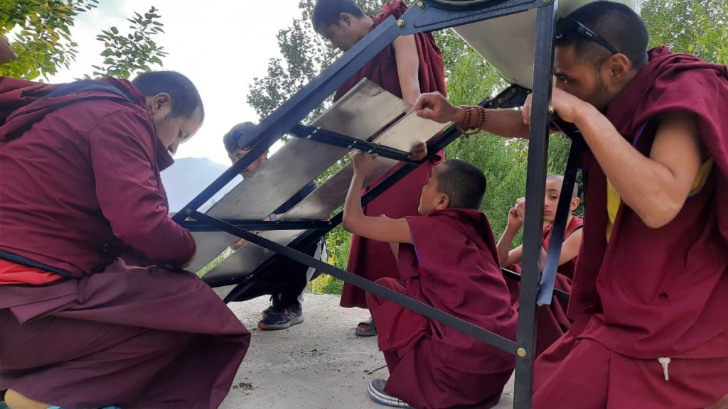 solar water heater being setup at the monastery